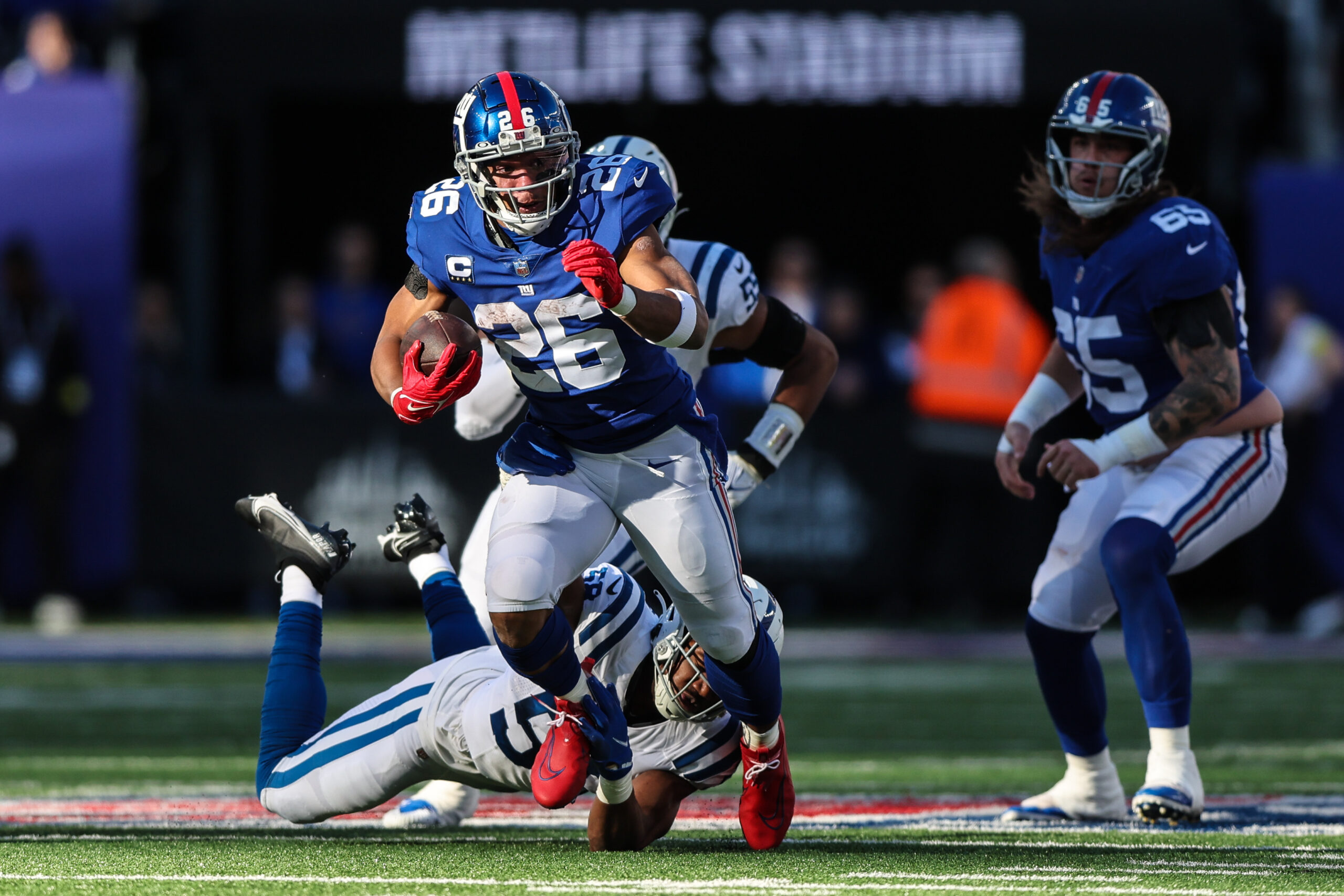 January 1, 2023, East Rutherford, New Jersey, USA: New York Giants running  back Saquon Barkley (26) runs up field during a NFL game against the  Indianapolis Colts in East Rutherford, New Jersey.