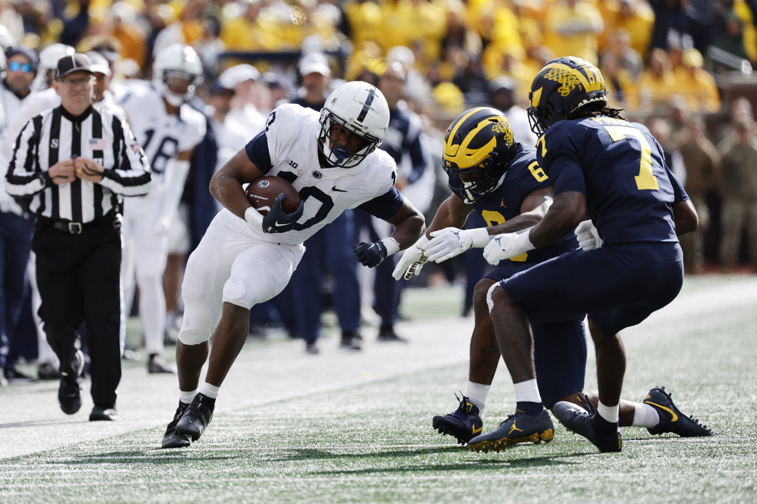 No. 5 Michigan tops No. 10 Penn St 41-17, runs for 418 yards