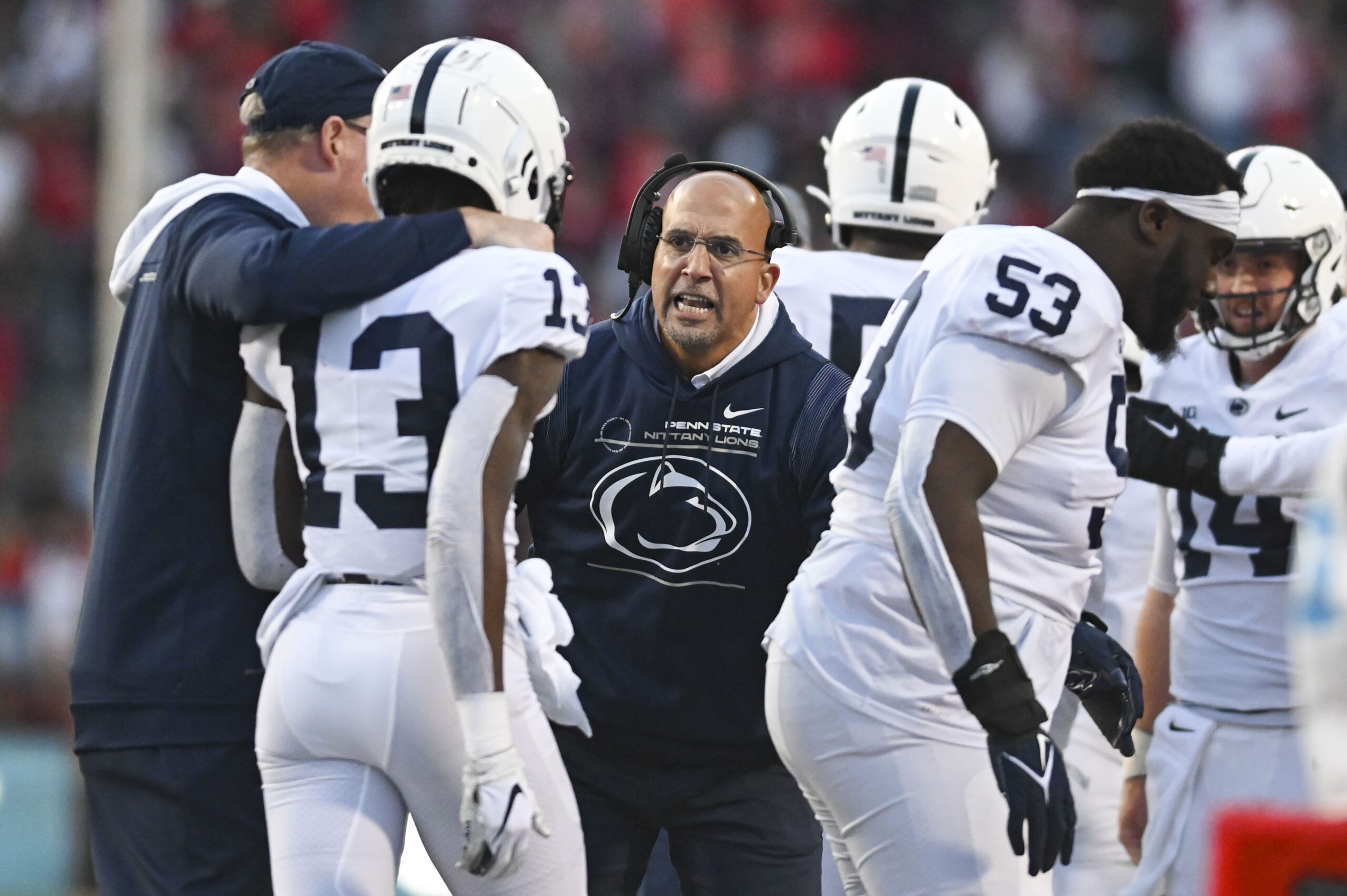 Watch Penn State head coach James Franklin do push-ups on the sideline